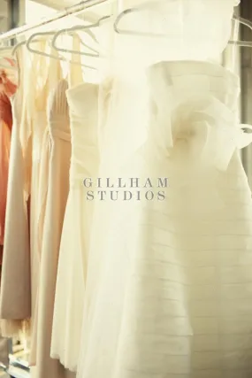 Close-up of classic, elegant wedding dresses on hangers